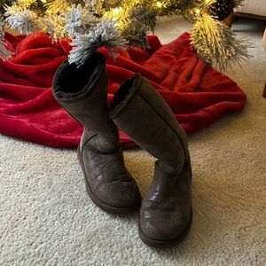 Gently used brown tall Ugg boots